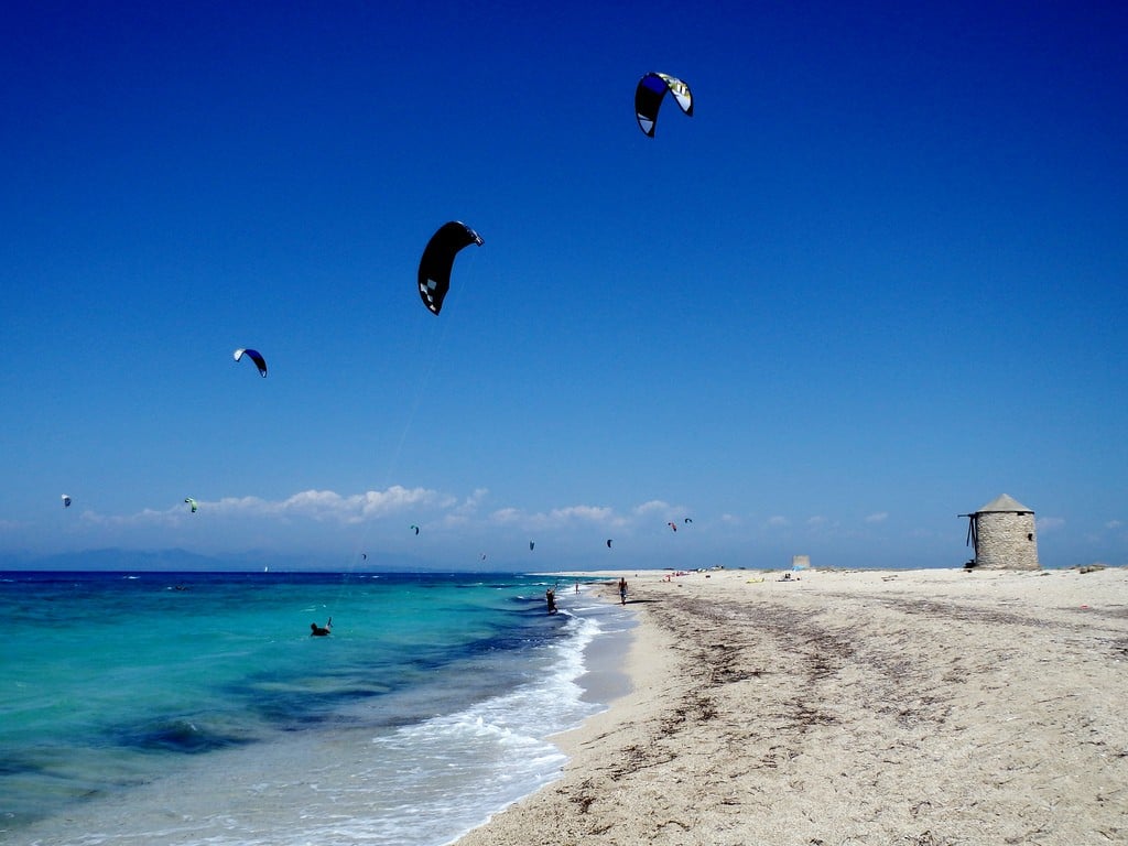 Kitesurfer riding the afternoon wind over the waters of Lefkada