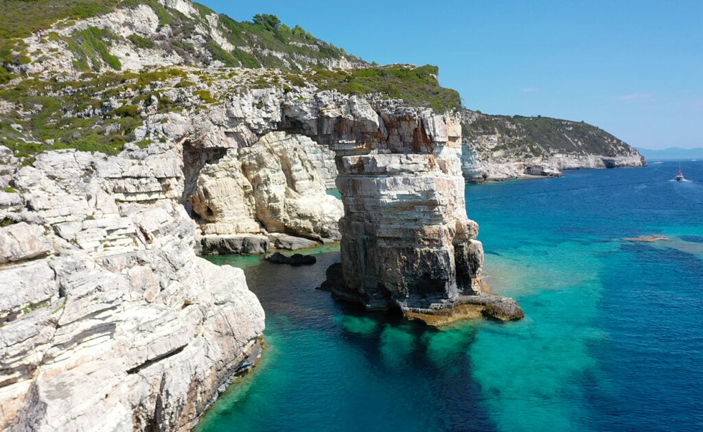 Tripitos Arch, a natural rock arch on the south of Paxos Island Tripitos Arch, a natural rock arch on the south of Paxos Island