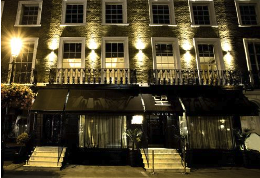 Nozomi restaurant entrance at night