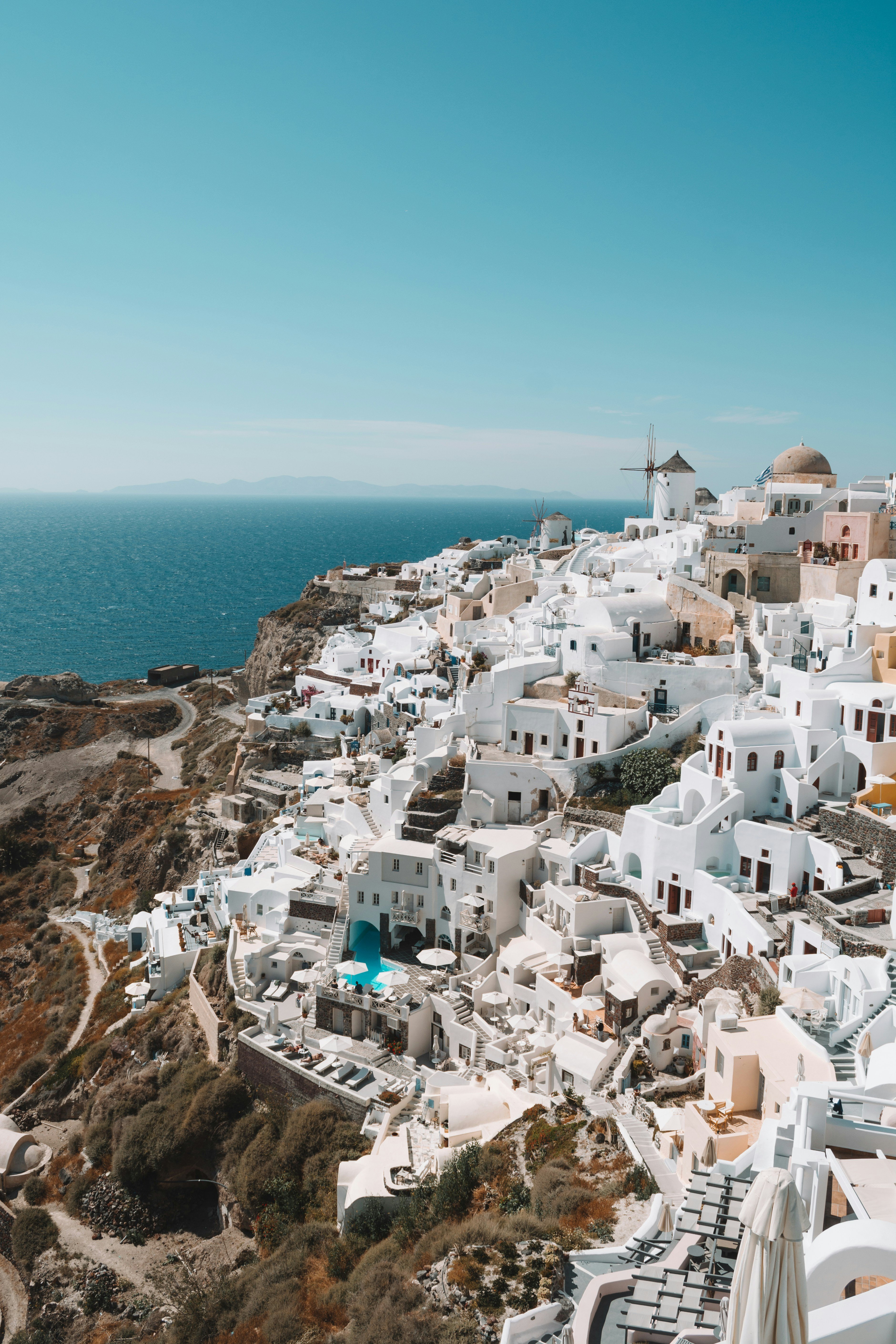Mesmerizing Santorini: A Journey Through Azure Skies, Crystal Waters, And Timeless Beauty - Alex Azabache J97Yqu81Fsw Unsplash - Greek List